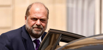 France's justice minister charged with abuse of position
