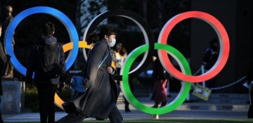 Olympics committee chief seeks end to spectator ban