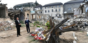 President Ilham Aliyev views crime scenes caused by Armenia's missile attacks on Ganja