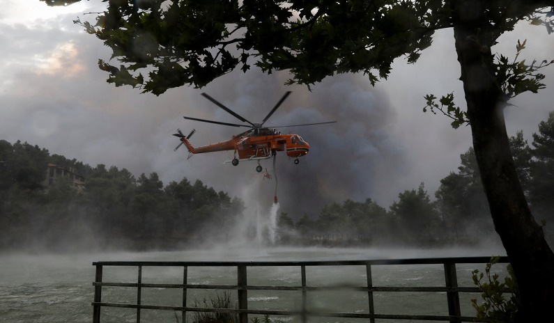 Severe forest fires in Greece prompt mass evacuations