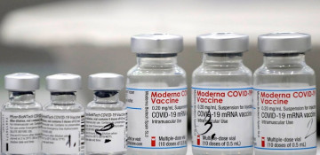 Spain approves COVID booster shot for over 70s