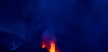 Hundreds evacuated as red-hot lava threatens homes in Spain's La Palma