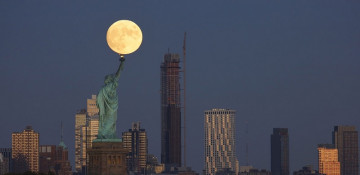 In Photos: Hunter's Moon illuminates night sky around the world