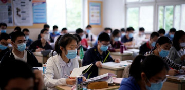 China passes law to cut homework pressure on students