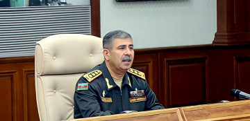 Defense Minister Zakir Hasanov gives instructions to troops on liberated areas at new service meeting