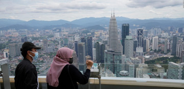 Malaysia to reopen to international visitors by Jan. 1 - govt council