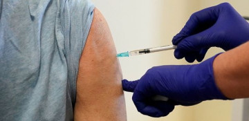 France extends COVID-19 booster shots to all adults