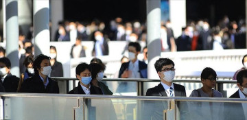 Japan to reduce quarantine days for COVID-19 close contacts