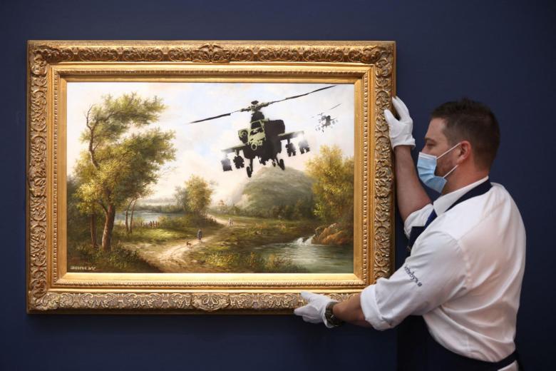 Owned by Robbie Williams, 2 Banksy works sold at London auction