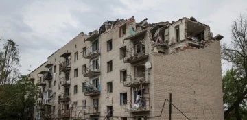 Death toll in Russian rocket strike on apartment building in Kharkiv rises to 12