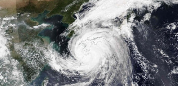Typhoon lashes central Japan, killing two