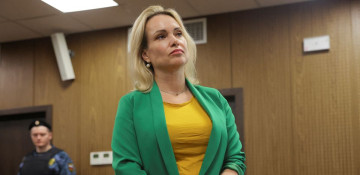 Russian TV protester listed as wanted fugitive