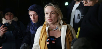 Russian journalist who fled house arrest says she is innocent