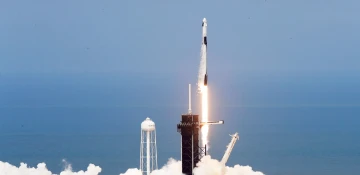 SpaceX capsule heads to space station ferrying NASA crew and Russian