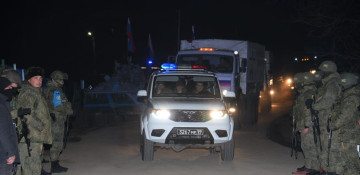 Russian peacekeepers' supply vehicles pass along Lachin road without any issues