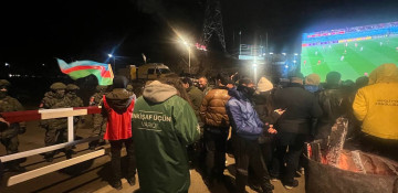 ‘It is nighttime: protesters watching Moroccan and Croatian match on a huge monitor’ – News.Az chief editor reports from the site (VIDEO)