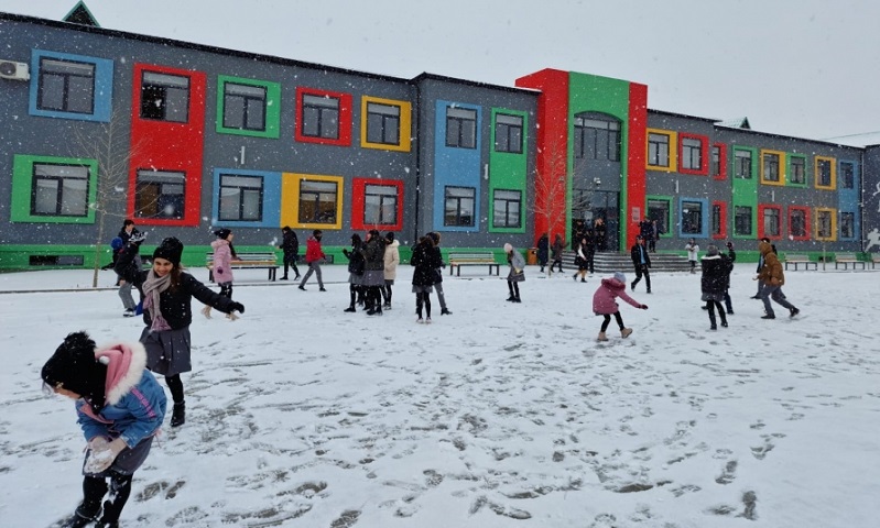 In Photos: First snowfall brings joy to schoolchildren in liberated Aghali