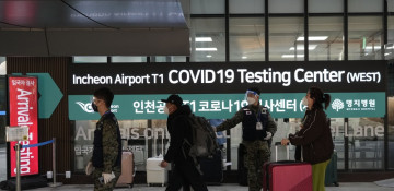 China imposes transit curbs for S.Korea, Japan in growing COVID spat