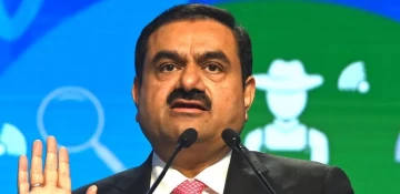 Asia's richest man hits back at 'con' allegations