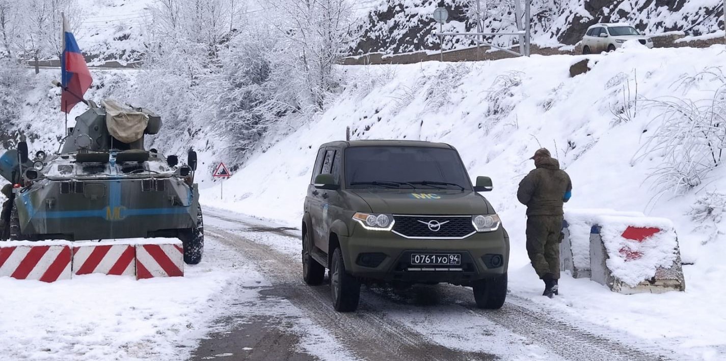 Another car of Russian peacekeepers passes freely along Azerbaijan's Lachin-Khankendi road