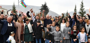 President Ilham Aliyev and First Lady Mehriban Aliyeva meet with residents of Talish village 