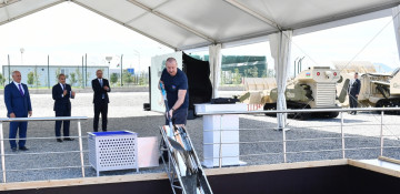 President Ilham Aliyev viewed works done in Araz Valley Economic Zone Industrial Park and laid foundation stone for some facilities