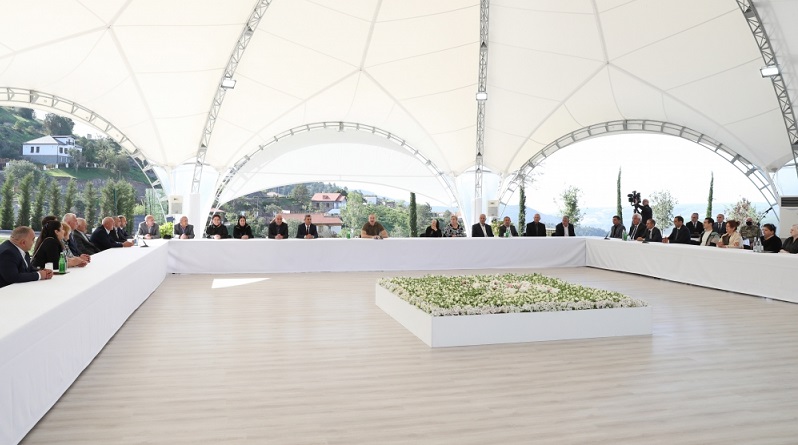 President Ilham Aliyev meets with people who returned to Lachin city and presents house keys to them