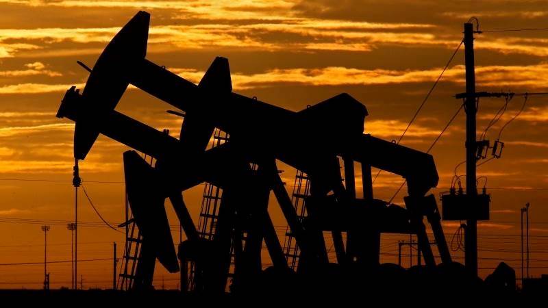 Oil resumes slide on demand worries after UK rate hike
