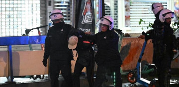 Police arrest 63 in Belgium as violent protests in France spread to Brussels