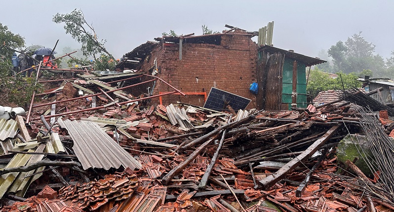 At least 10 people killed, some 100 feared trapped after landslide in India
