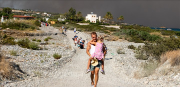 Thousands of tourists evacuated as huge wildfire rages across Greece's Rhodes island