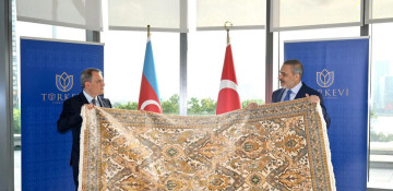 Azerbaijani FM presents Karabakh carpet to Turkish FM
