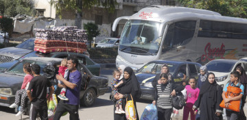 First evacuees leave Gaza as Israeli offensive intensifies