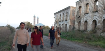 International travelers familiarize themselves with Armenian vandalism in Aghdam