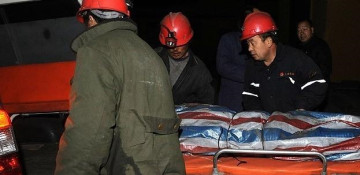 26 killed in China coal mine company building fire