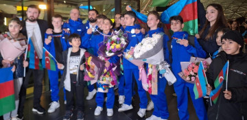 Azerbaijani gymnasts return home with medals from UK