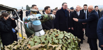 Presidents Ilham Aliyev and Aleksandar Vučić view military equipment