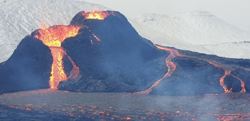 Iceland volcano erupts near town after weeks of quake activity