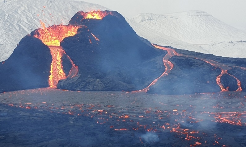 Iceland volcano erupts near town after weeks of quake activity