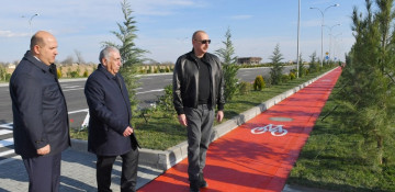 President Ilham Aliyev inspects ongoing works on internal roads of Aghdam city