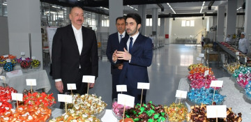 President Ilham Aliyev examines operations of confectionery manufacturing enterprise in Lankaran