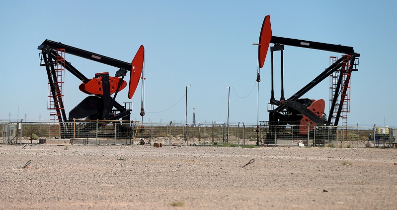Oil flat as weaker IEA outlook weighs on US rate cut hopes