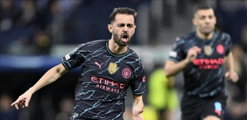 Man City hammer Brighton 4-0 to be hot on English leaders Arsenal's trail